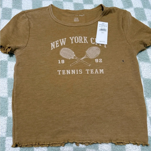 American Eagle New York City Tennis Graphic Baby Tee
Size Small - Picture 3 of 4